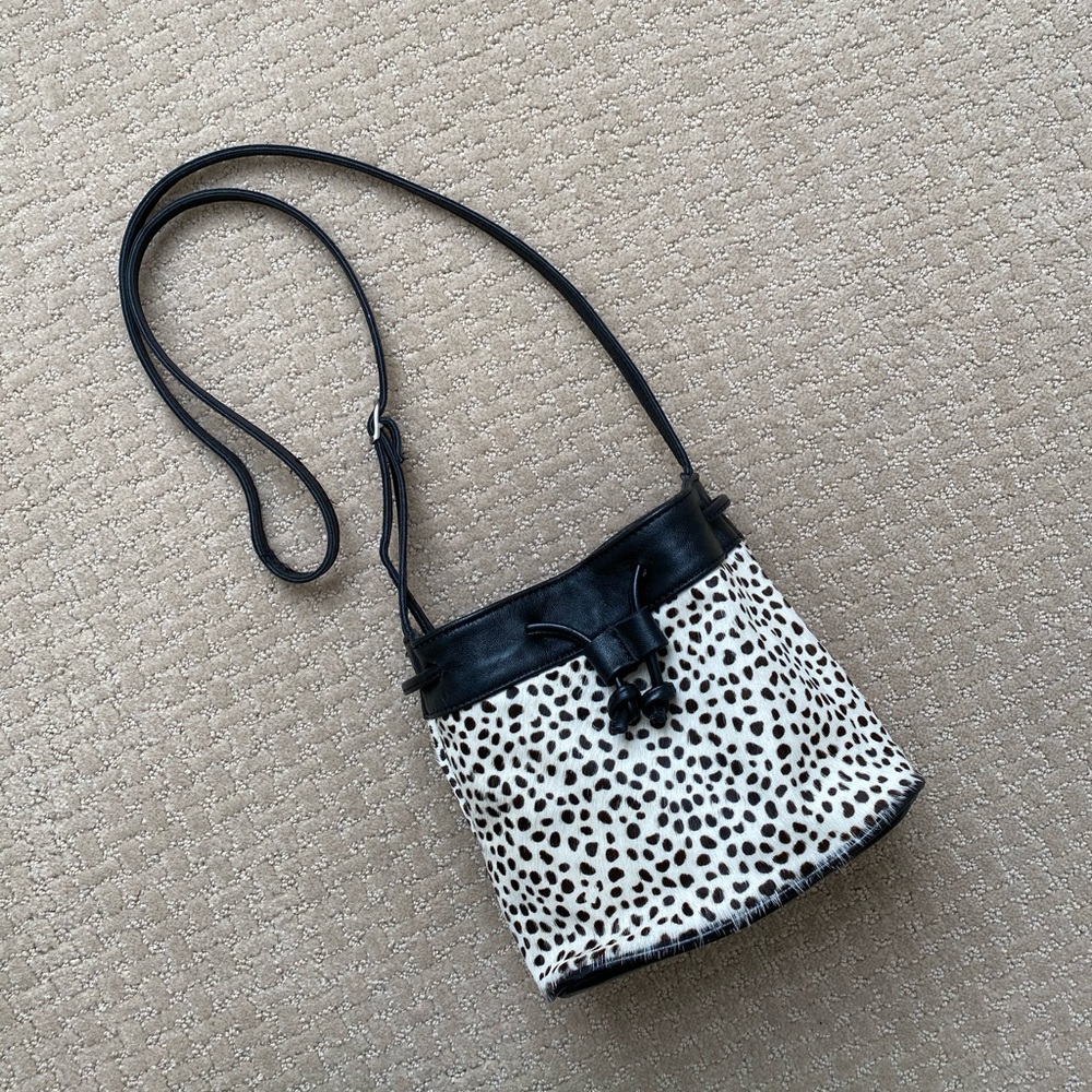 Spotted faux fur bucket bag